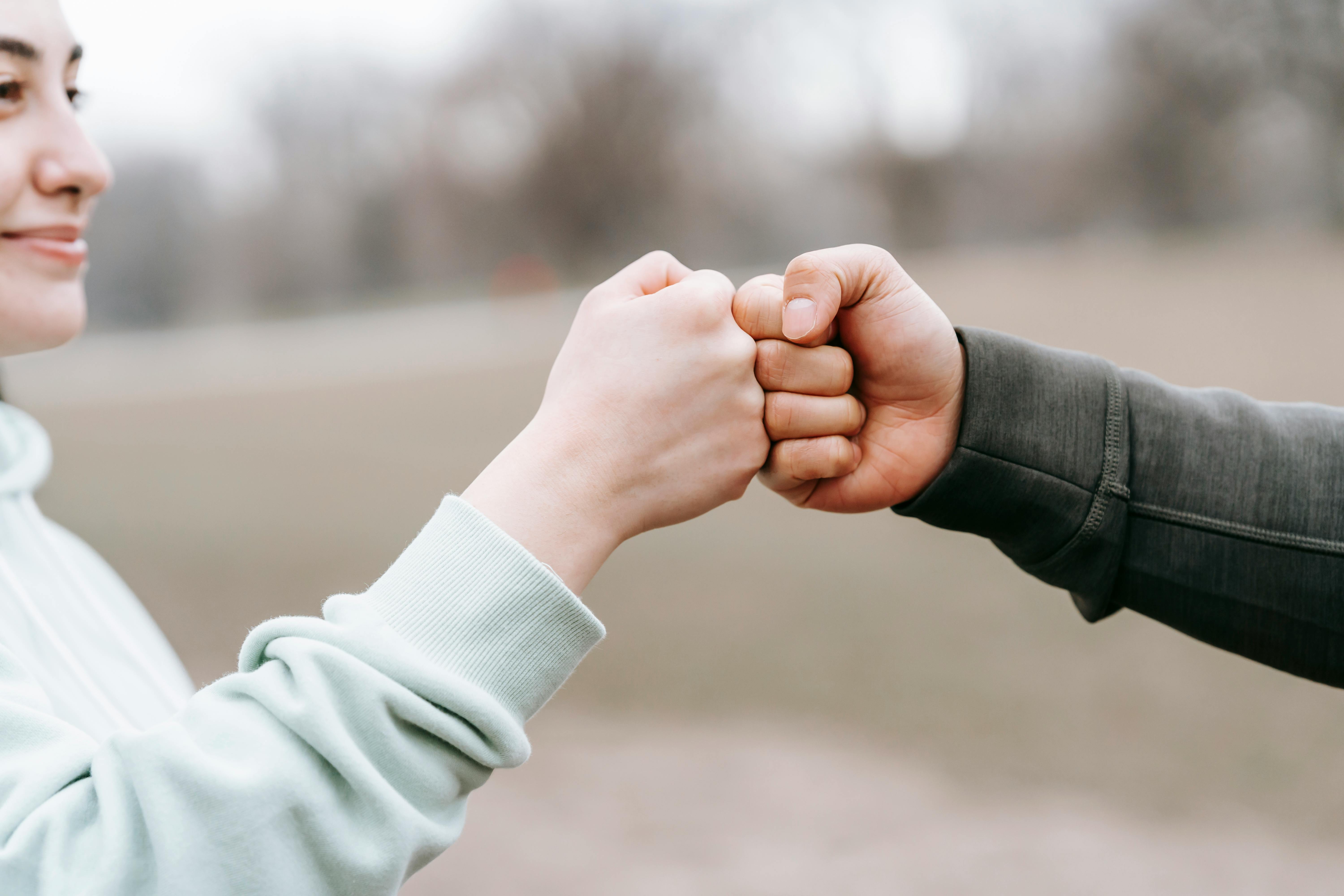 Intrivium team members collaborating as equals — each owning their commitments without managers or bosses